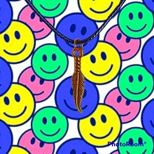 Feather charm necklace